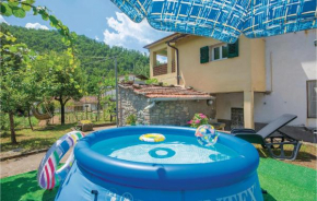 Отель Two-Bedroom Holiday Home in Astracaccio LU  Баньи-Ди-Лукка